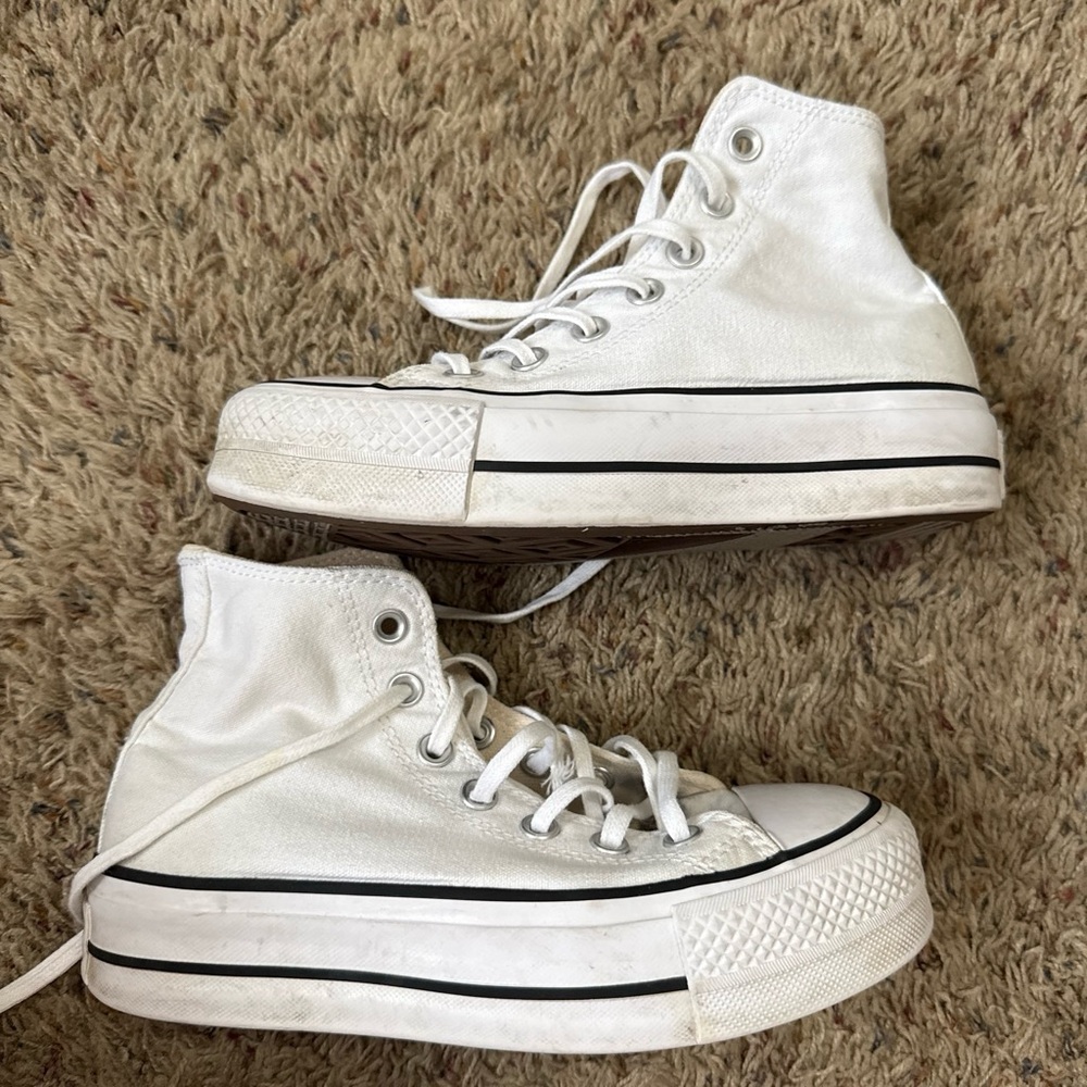 Platform white high top Converse. Gently worn but great condition !